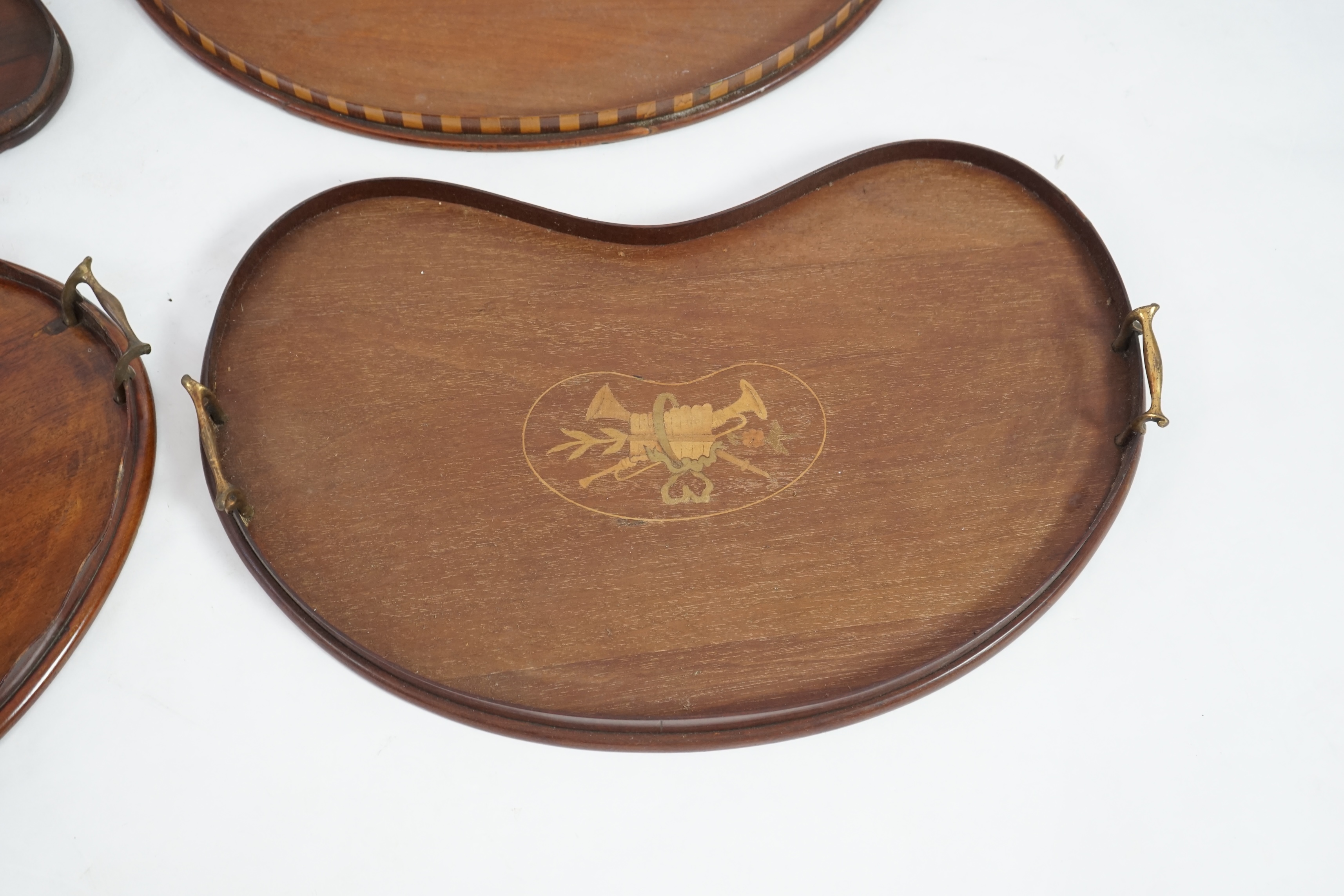 Four Edwardian inlaid mahogany gallery trays